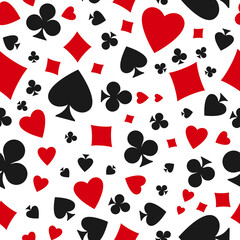 Seamless pattern with card suits - hearts, clubs, spades and diamonds.