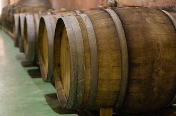 old wooden wine barrels in a wine press
