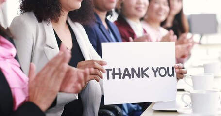 Group of businesswomen sitting at working desk, clapping hands and show thank you word for appreciating to someone in modern office company. Concept of good circumstance in company with colleagues.