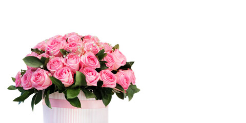 Bouquet of pink roses in the box isolated on white background. Congratulations on March 8, Valentine's Day, Mother's Day, Birthday, Anniversary, Wedding, Teacher's Day, to women. Copy space.