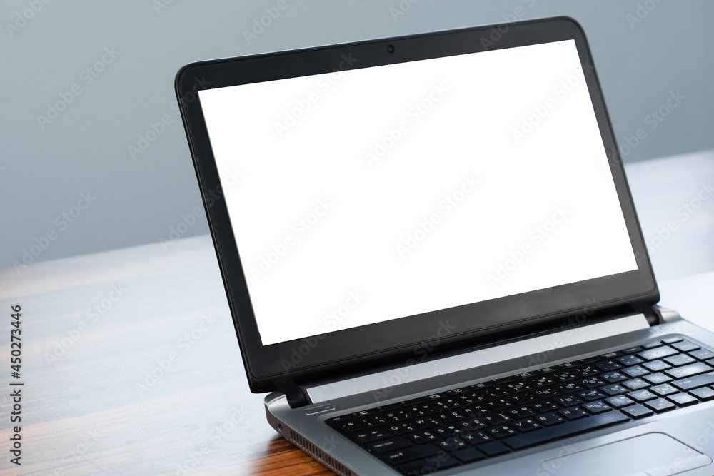 Poster computer notebook blank screen design mockup on desk new design modern concept
