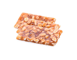 Honey bars with peanuts on white background