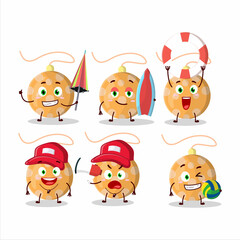 Happy Face christmas lights orange cartoon character playing on a beach