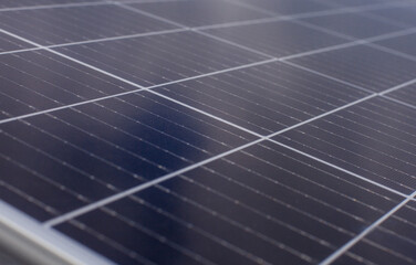 Close up of an array of photovoltaic solar panels.