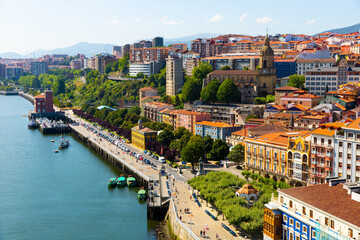 Fototapeta na wymiar View of Portugalete from Vizcaya Bridge bridge in Spain, crossing the River