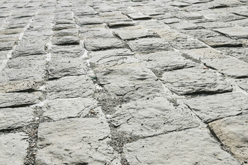 Detail of old cobbled street - background.