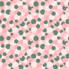 Pink and green polka dot seamless pattern. Round shapes repeat print. Circles backdrop. Cute bubble background for textile, fabric, wallpaper, wrapping paper and design.