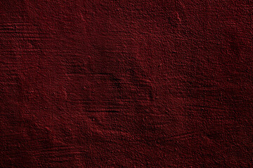Crimson colored wall background with textures of different shades of crimson red