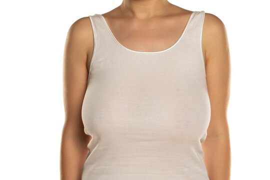 a woman with big breasts without a bra in a white shirt