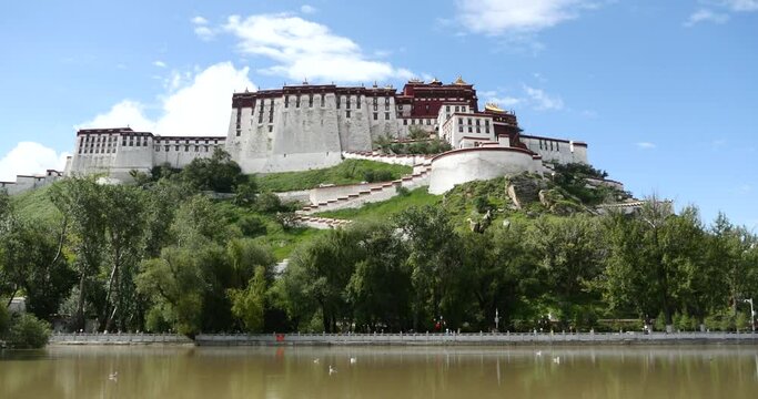4k Potala in Lhasa;Tibet.lake with willow in lasa park.