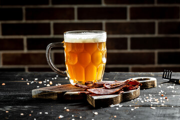 Basturma with beer. Armenian food. Sun-dried Basturma. Ready snacks. Beef jerky. Snacks for beer....