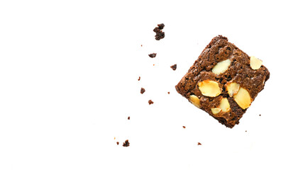 pieces of fresh homemade chocolate brownie, square shape, with sliced almond on top isolated on white background, top view