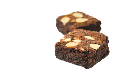 pieces of fresh homemade chocolate brownie, square shape, with sliced almond on top isolated on white background with clipping path
