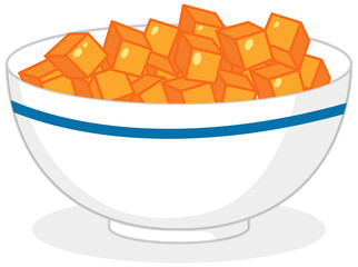 Orange candy dices in a bowl isolated