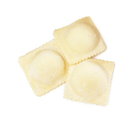 Uncooked ravioli with filling on white background, top view