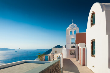 Fototapeta na wymiar White architecture on Santorini island, Greece. Summer landscape, sea view. Famous travel destination