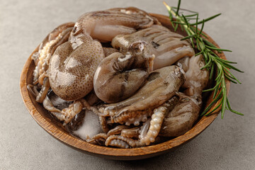Webfoot octopus resembling uncooked trimmed octopus