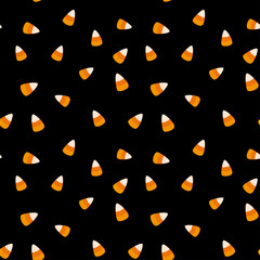 Halloween candy corn seamless pattern for wrapping, fabric, party decoration. Fall holiday vector design with sweet treats in black and orange colours.
