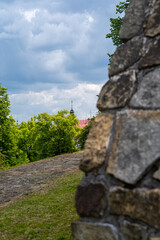 The church in Poznań seen behind the old wall.