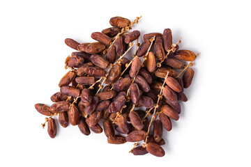 Dried dates (Deglet Nour or Royal dates) on branches isolated over white, top view. Clipping path at 300%