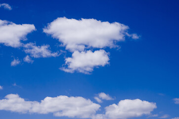 Naklejka na ściany i meble blue sky background with tiny clouds, beautiful blue sky with white clouds
