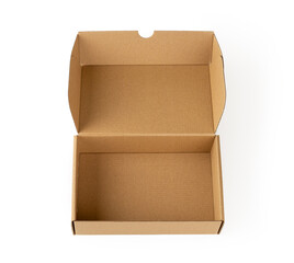 Open brown gift box isolated on a white background. Empty cardboard box for packing small parcels and gifts close-up. New clean paper carton container with lid.