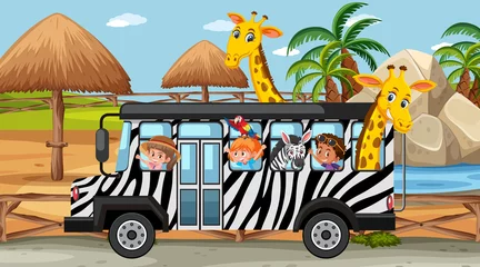 Wandaufkleber Safari scene at daytime with kids and animals on bus © brgfx