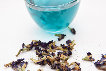 Butterfly pea tea or blue tea with dry anchan flowers, Asian healthy herbal drink