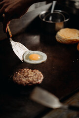 meat patty on frying top