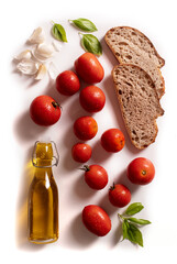 Fresh ingredients for making bruschetta on white background