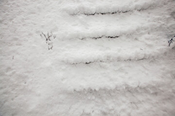 snow covered staircase in winter