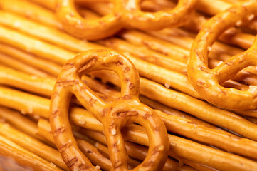 Bread sticks and bread figures with salt. Close-up Background image.