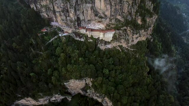 Aerial View Greek Orthodox Sumela monastery in Turkey one of the most impressive touristic sights from above in the whole Black Sea region, in a valley, Trabzon Province