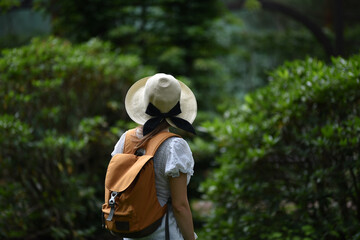 Tourist in the Botanical Garden in selective focus