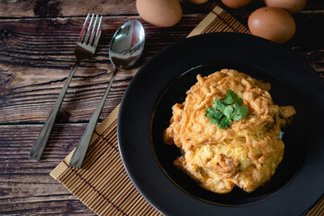 Top view Thai traditional omelets on top streamed rice for lunch,  Thailand