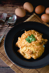 Top view Thai traditional omelet on steamed rice for launch 