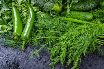 Fresh organic homegrown herbs and leaf vegetables background