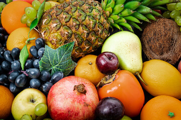 Assortment of healthy raw fruits. Mixed fruits.