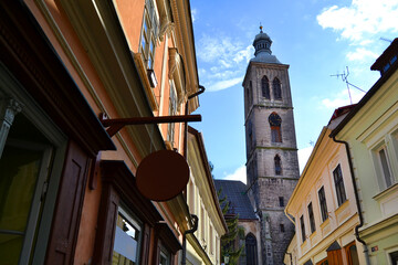 Historic center of Kutna Hora. Beautiful church of St James (Jacob) in the background. Central Bohemian Region, Czech Republic.