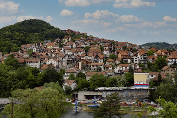 Fototapeta na wymiar Picturesque town in the slope Uzice, Serbia