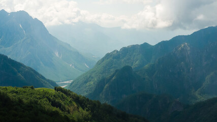 Fototapeta premium Mountain peak scenery in the clouds