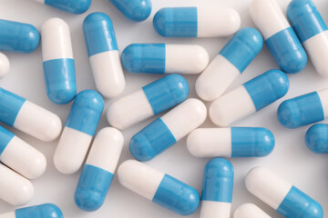 pills capsules close up on top view isolated in white background