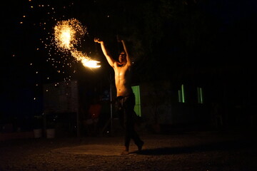 Fire man dance show power beach
