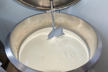 phases of ricotta production in a cheese factory in Greece