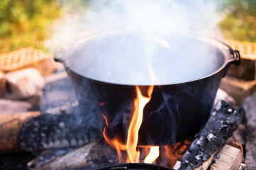 Dutch oven cooking on a campfire