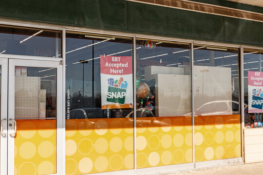 SNAP And EBT Accepted Here Sign. SNAP And Food Stamps Provide Nutrition Benefits To Supplement The Budgets Of Disadvantaged Families.