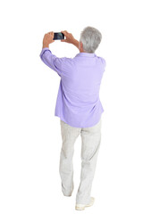 senior man taking selfie