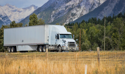 Heavy cargo on the road. A truck hauling freight along a highway