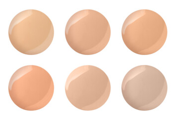 Set with different shades of liquid skin foundation on white background, top view