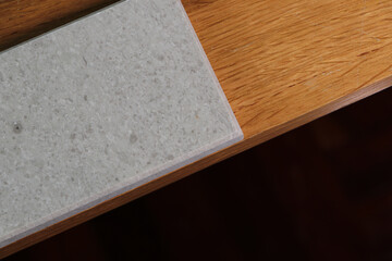 View of color samples marble  on oak wood table.